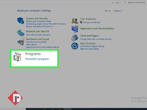 Select “Uninstall Programs” under “Programs” in Control Panel window